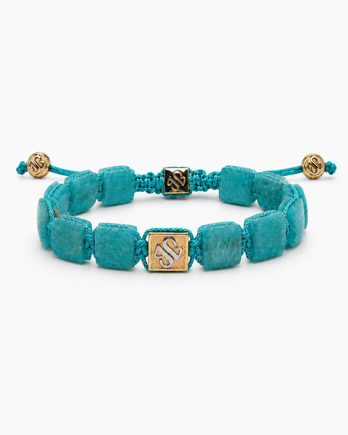 Turquoise beaded bracelet with gold accents on a white background