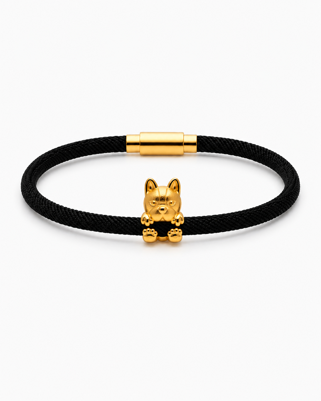Black cord bracelet with a gold cat charm on a white background