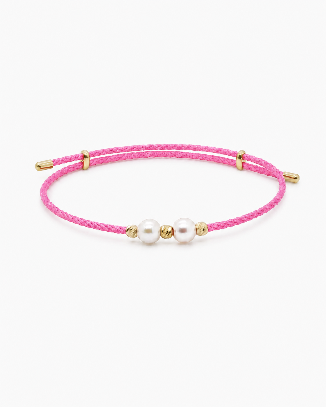 Pink bracelet with gold accents and pearls on a white background #Color_