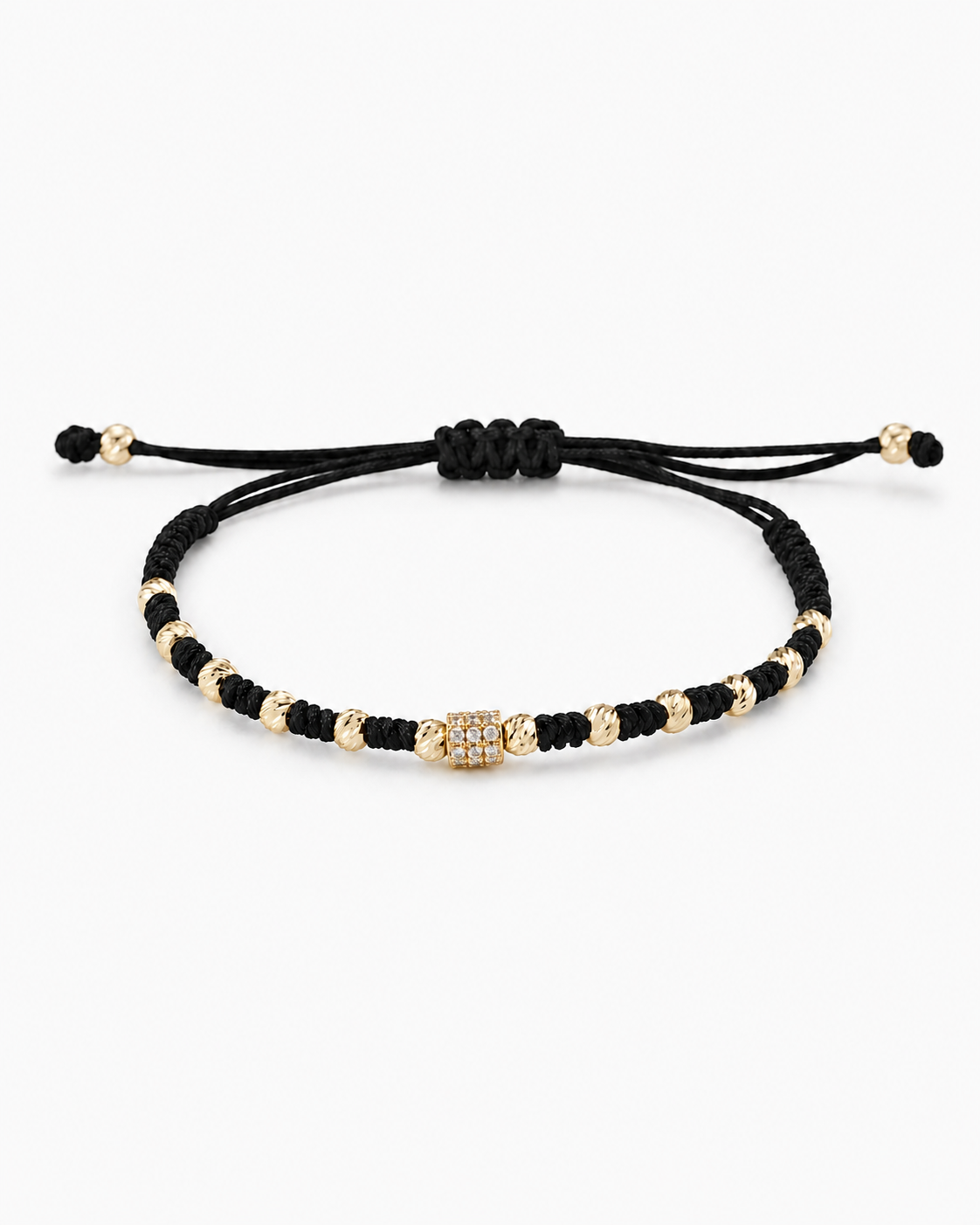Black and gold beaded bracelet on a white background