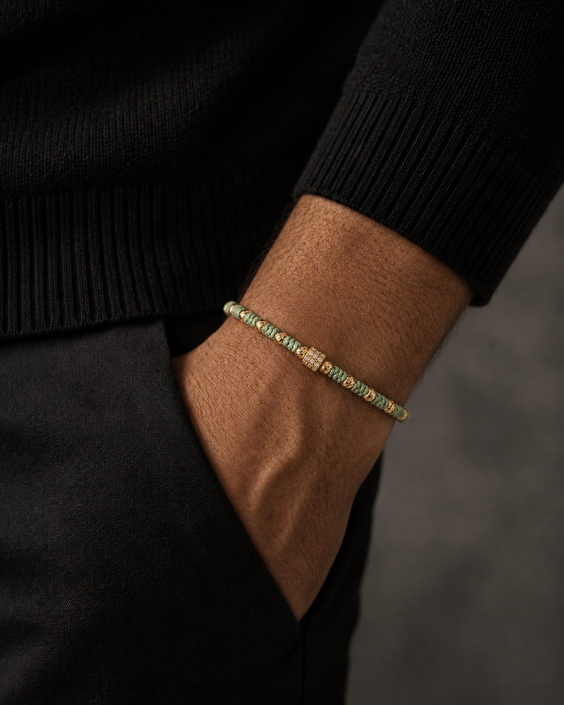 Close-up of a wrist wearing a bracelet with a blurred background