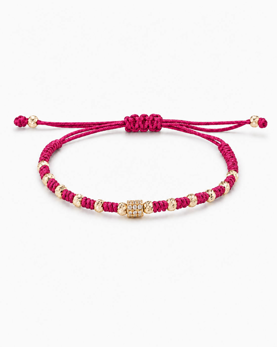 Pink braided bracelet with gold beads on a white background #Color_Magenta