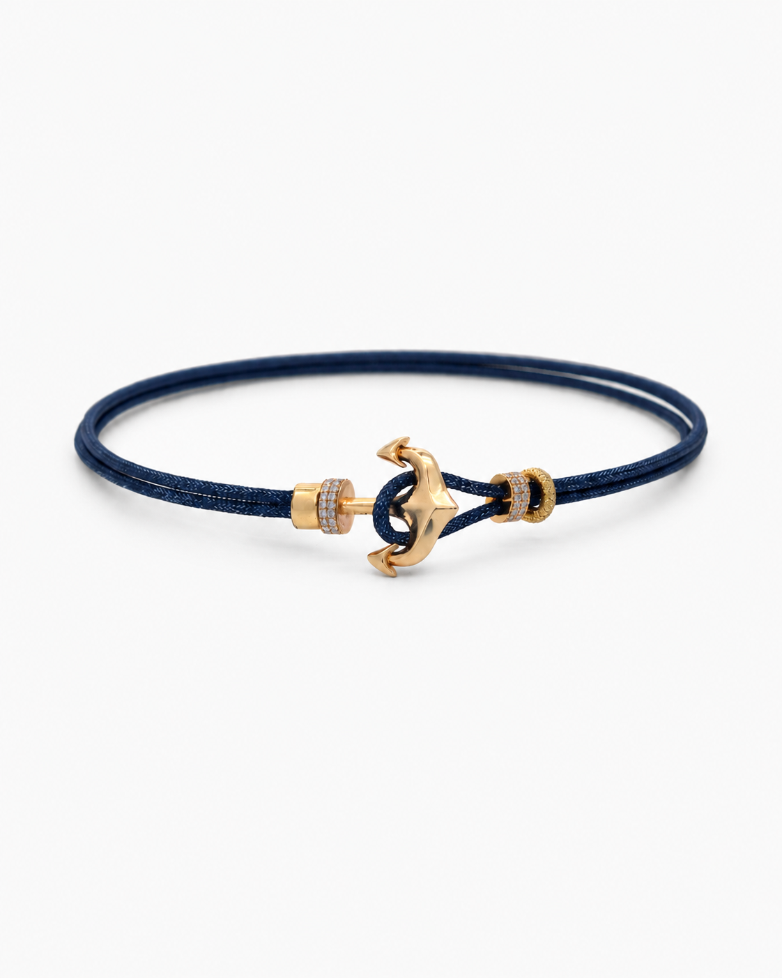 Navy blue bracelet with gold anchor clasp on a white background