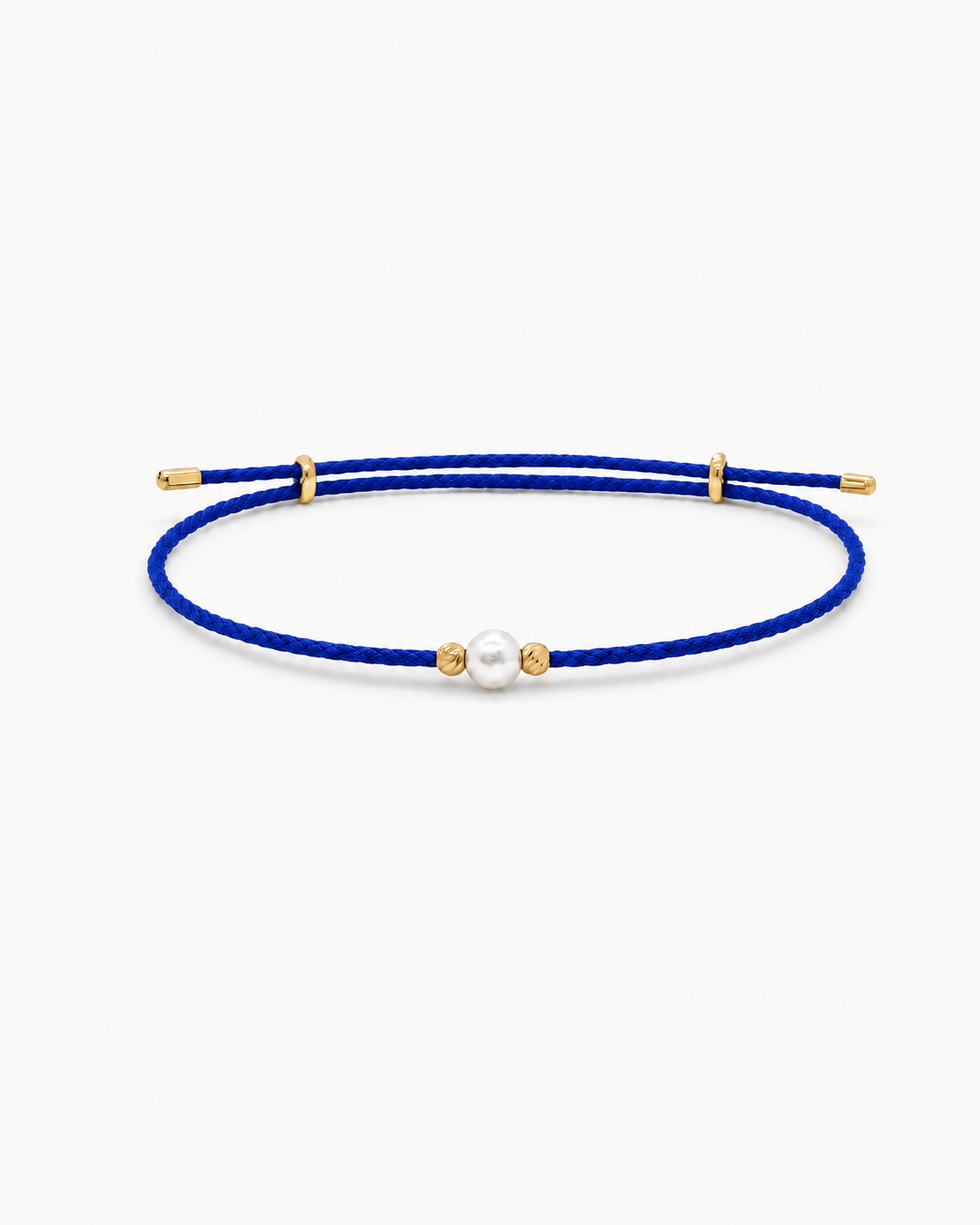 Blue cord bracelet with a pearl and gold accents on a white background #Color_