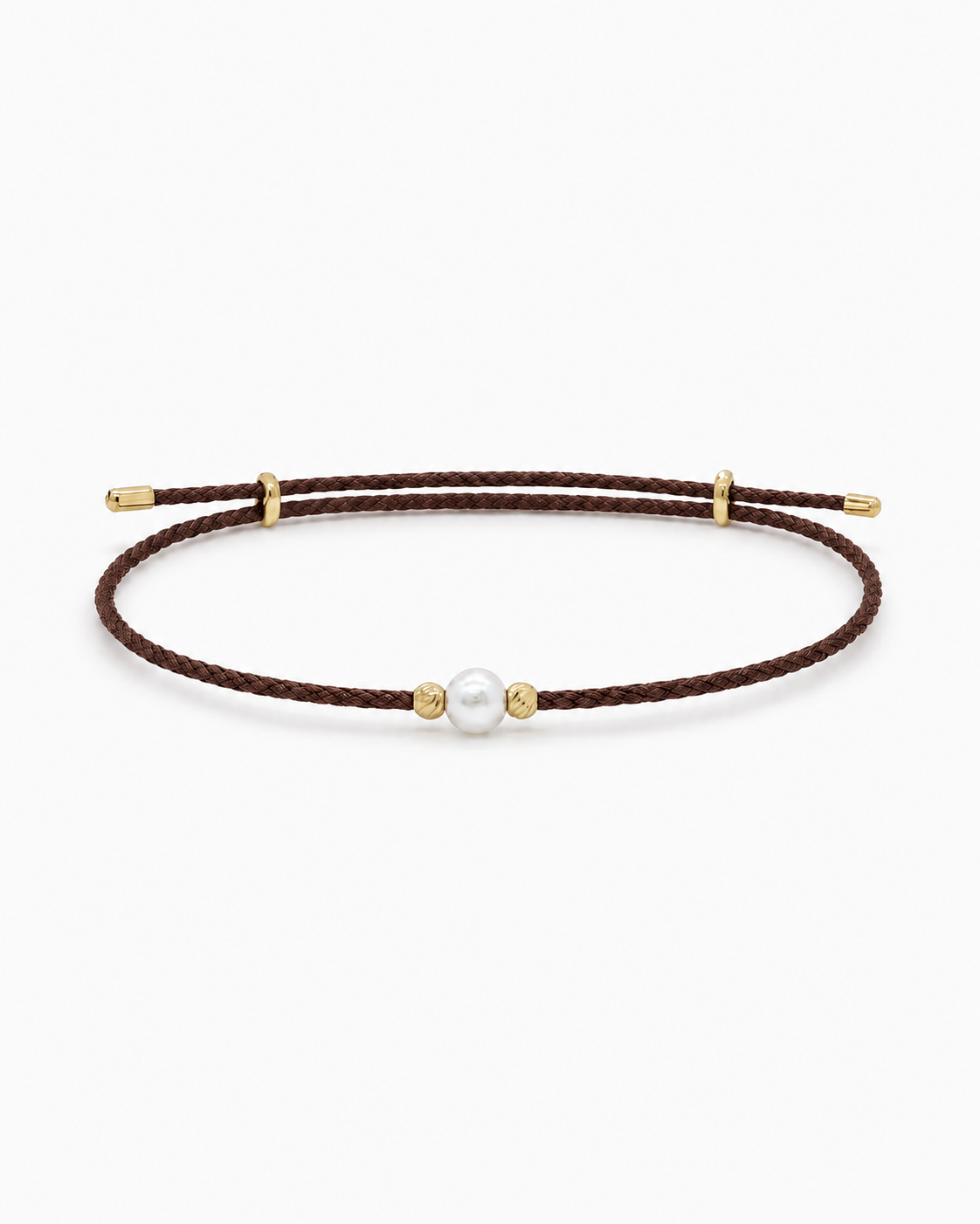 Brown cord bracelet with a pearl and gold accents on a white background #Color_