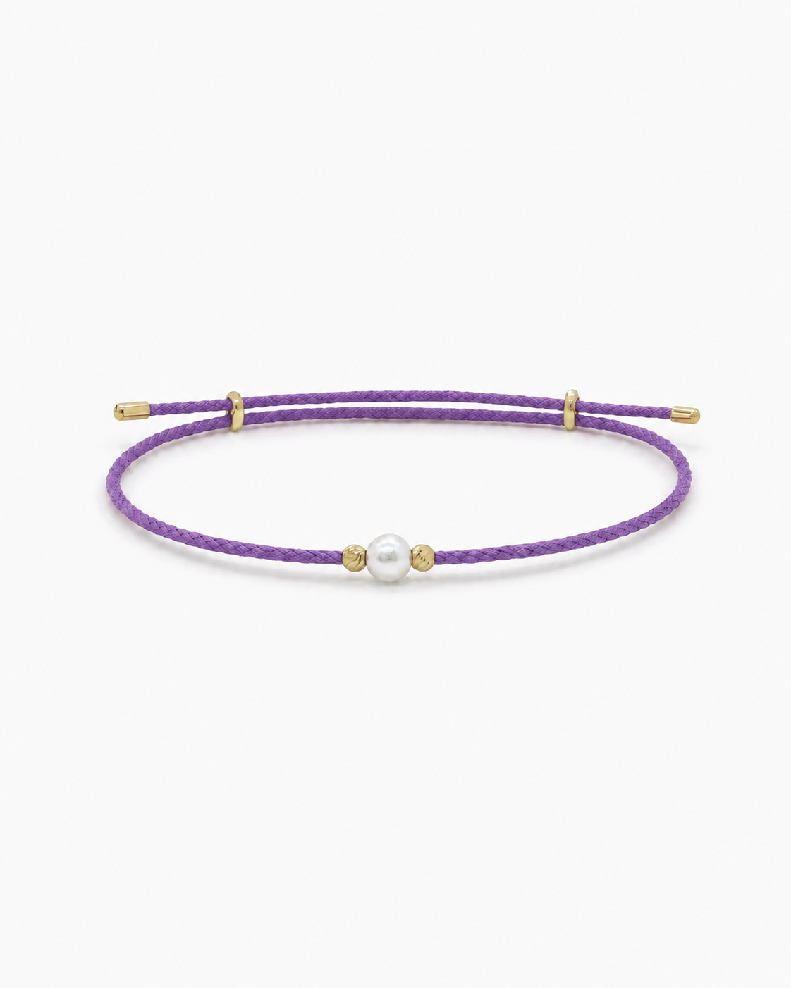 Purple bracelet with gold accents and a pearl on a white background #Color_