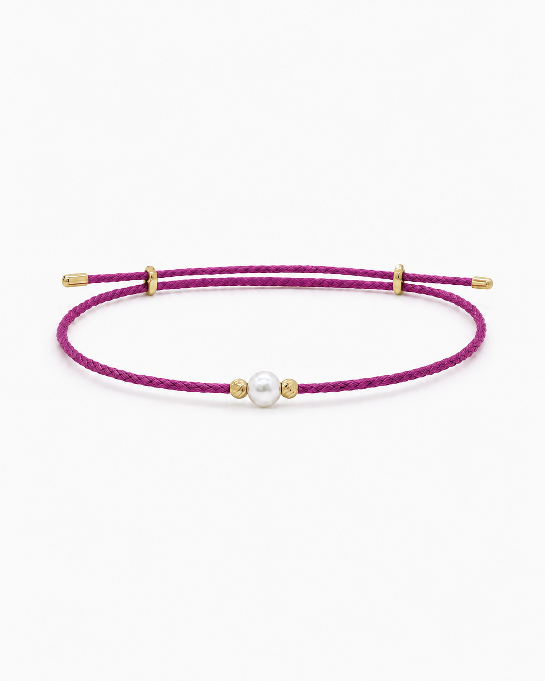 Purple bracelet with a pearl and gold accents on a white background #Color_