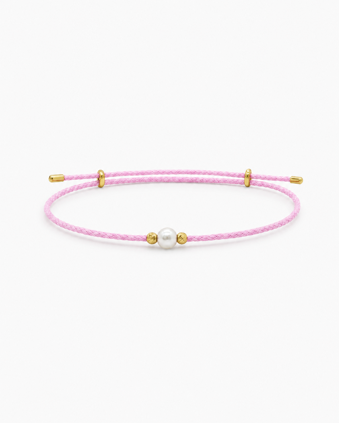 Pink bracelet with gold accents and a pearl on a white background #Color_