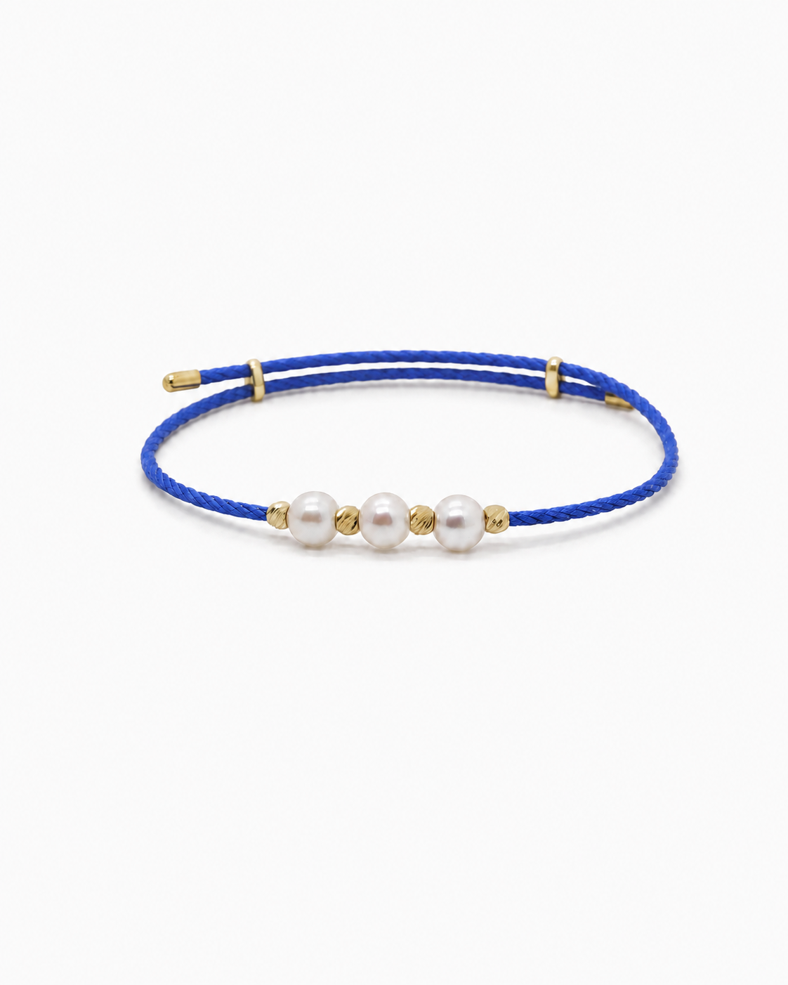 Blue bracelet with three pearls on a white background #Color_Blue