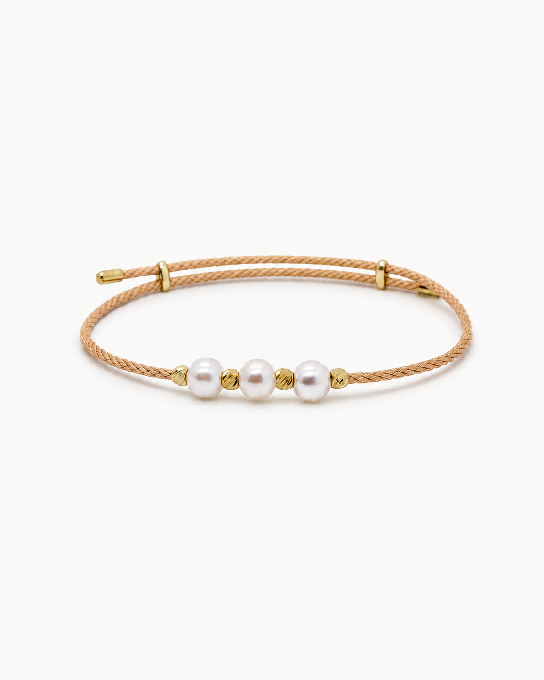 Gold bracelet with three pearls on a white background #Color_Desert