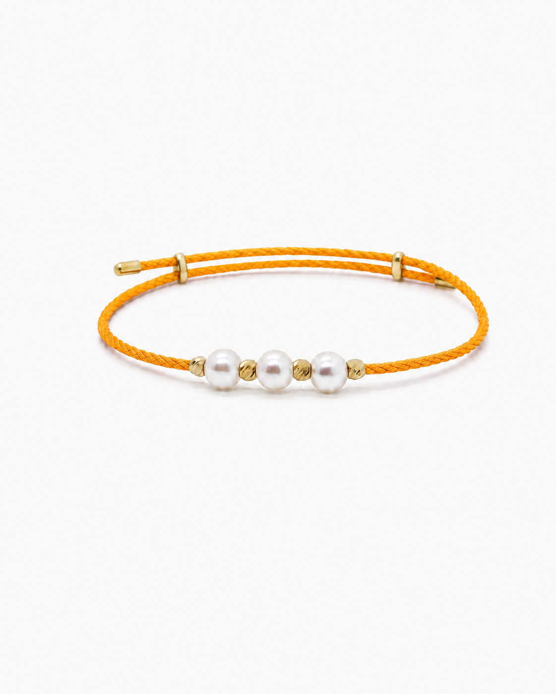 Orange bracelet with three pearls on a white background #Color_Orange