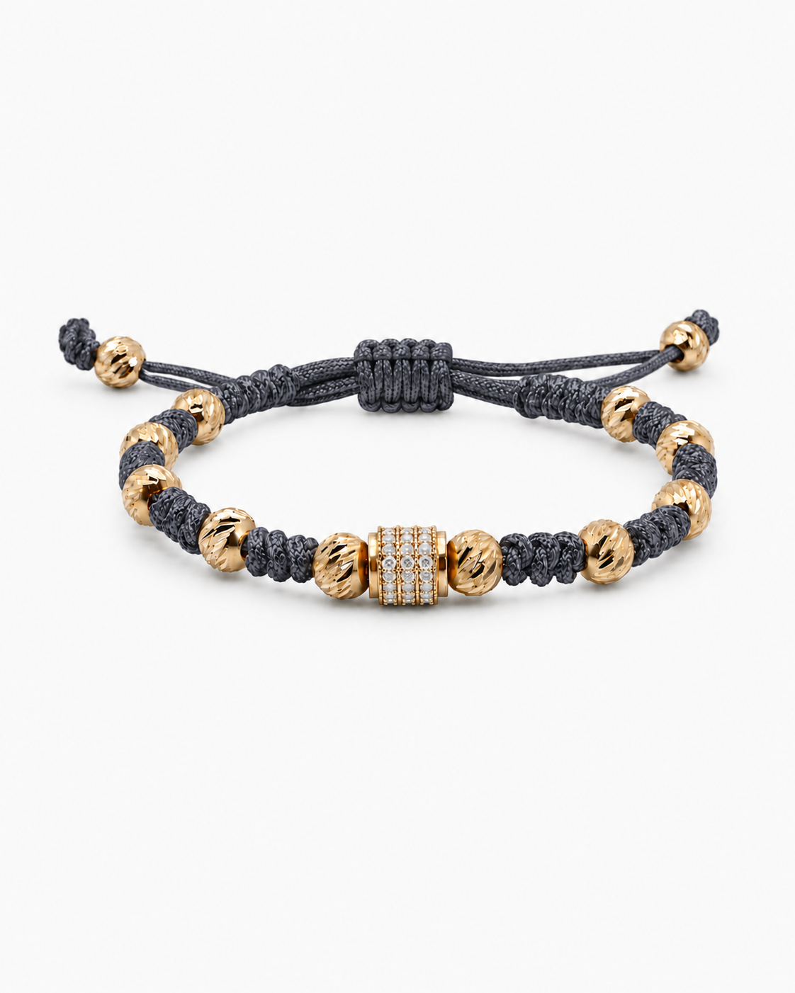 Bracelet with gold and black beads on a white background #Color_Dark Grey