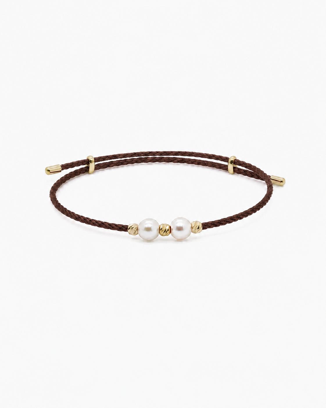 Bracelet with brown cord and gold beads on a white background #Color_