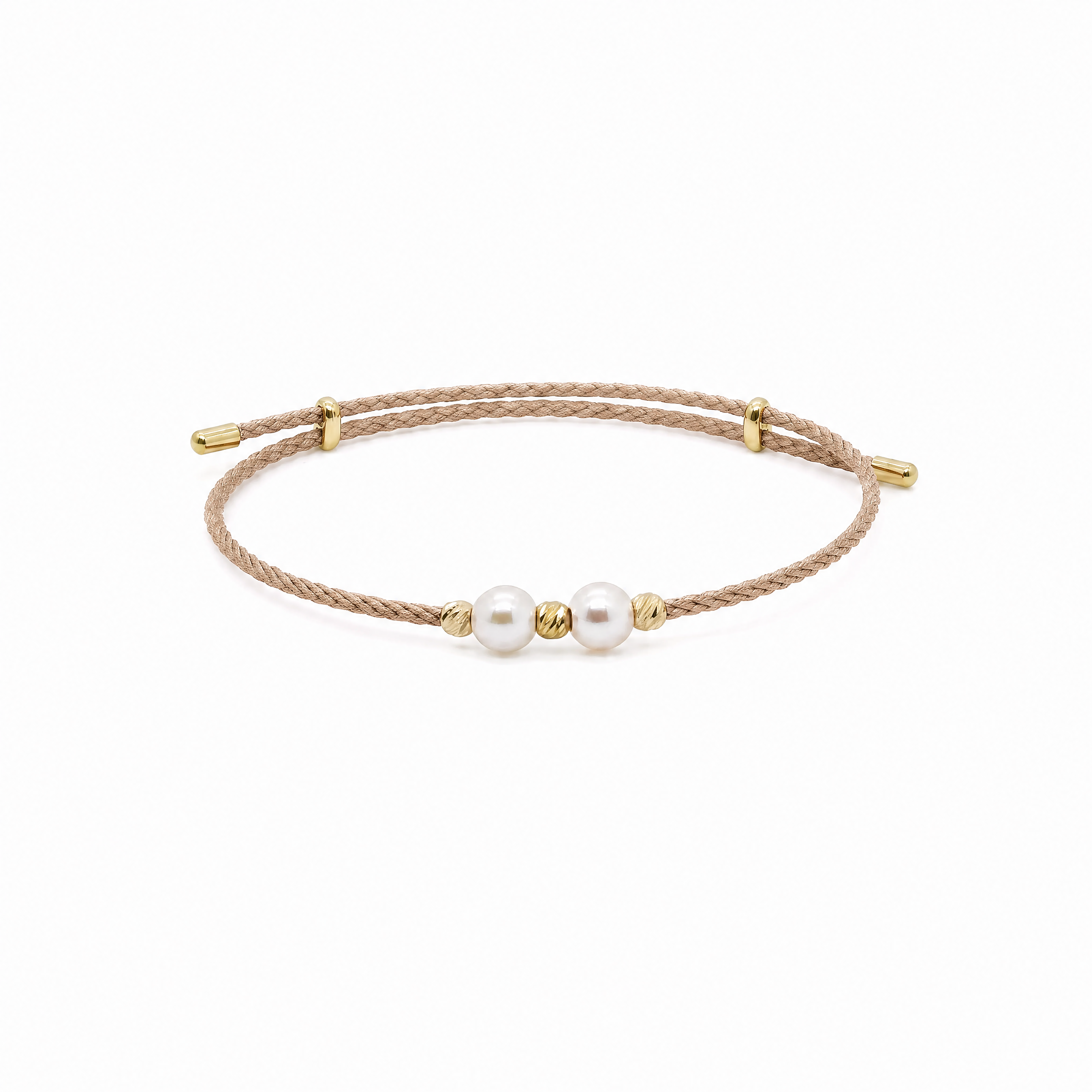Bracelet with gold accents and pearls on a white background #Color_