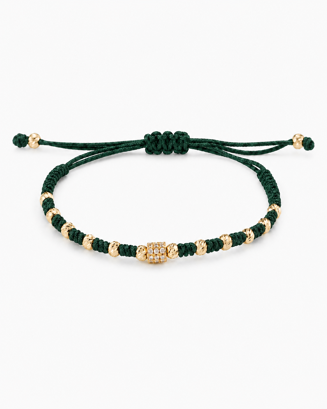 Green bracelet with gold beads on a white background #Color_Emerald