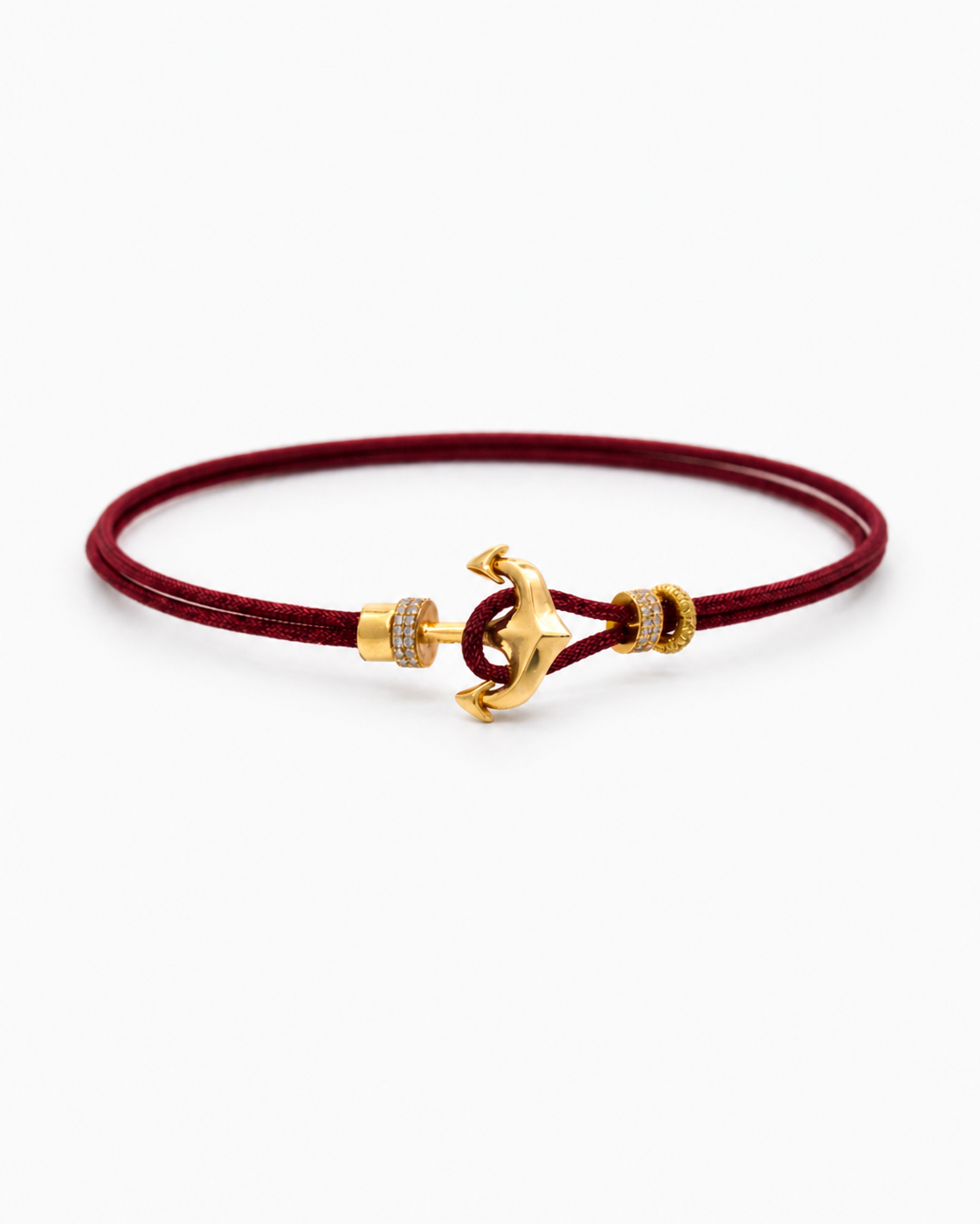 Red cord bracelet with a gold anchor charm on a white background #Color_Burgundy
