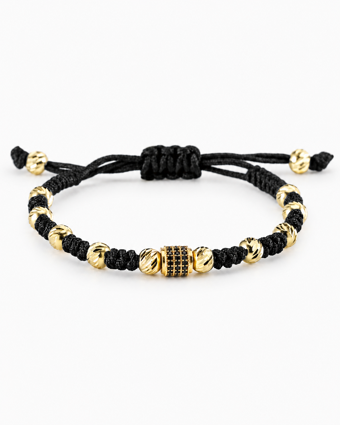 Black and gold beaded bracelet on a white background