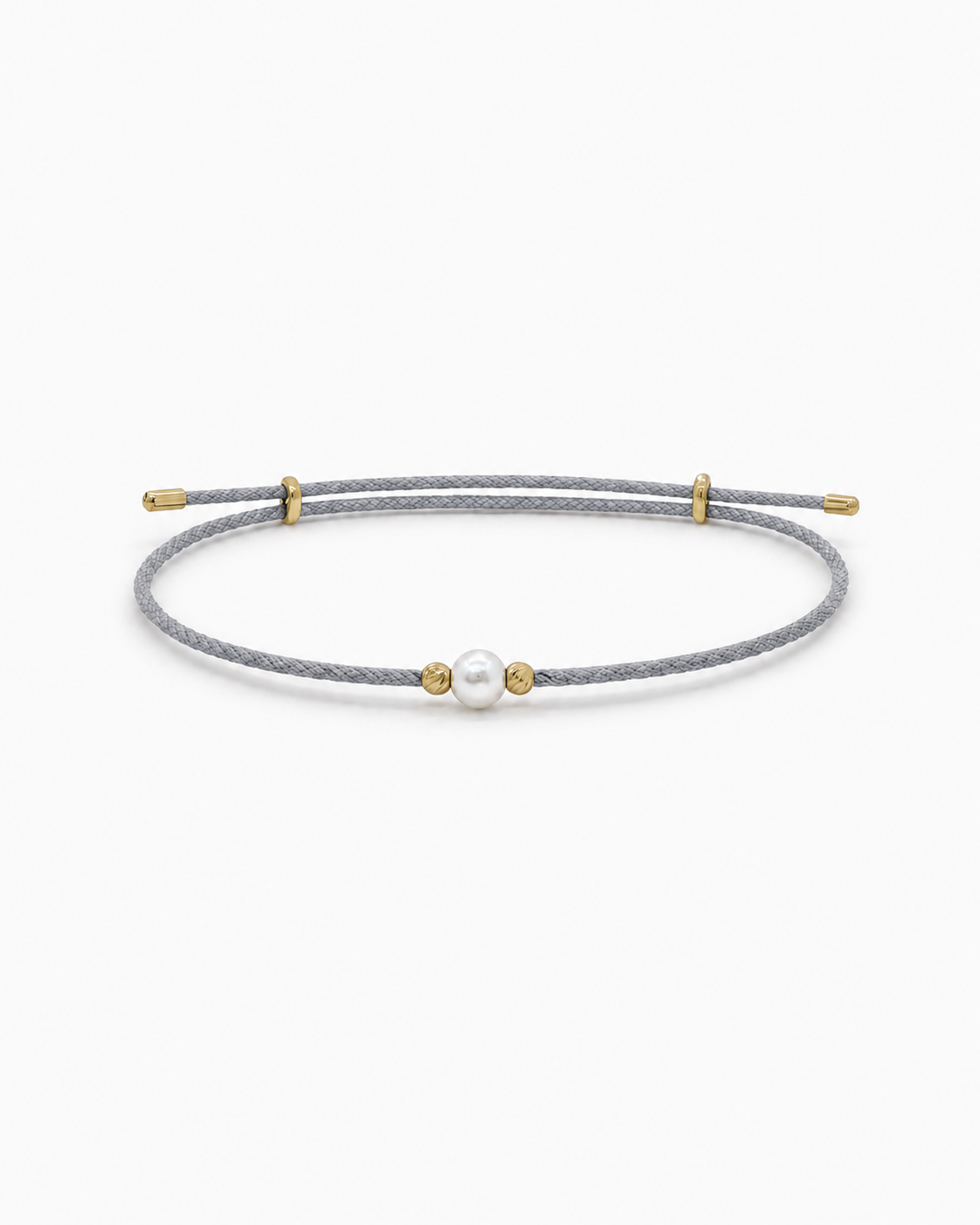 Gray cord bracelet with a pearl and gold accents on a white background #Color_