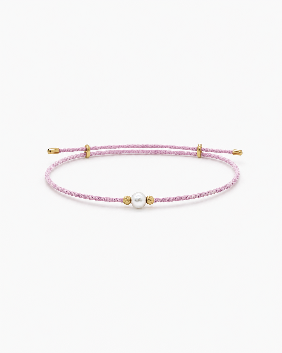 Pink bracelet with gold accents and a pearl on a white background #Color_