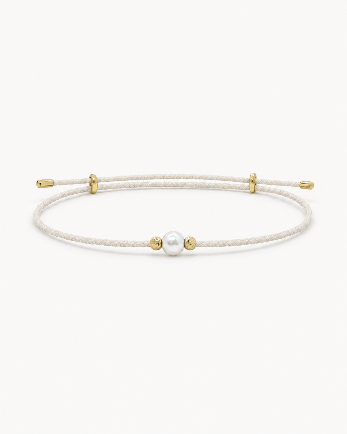 Bracelet with a pearl and gold accents on a white background #Color_