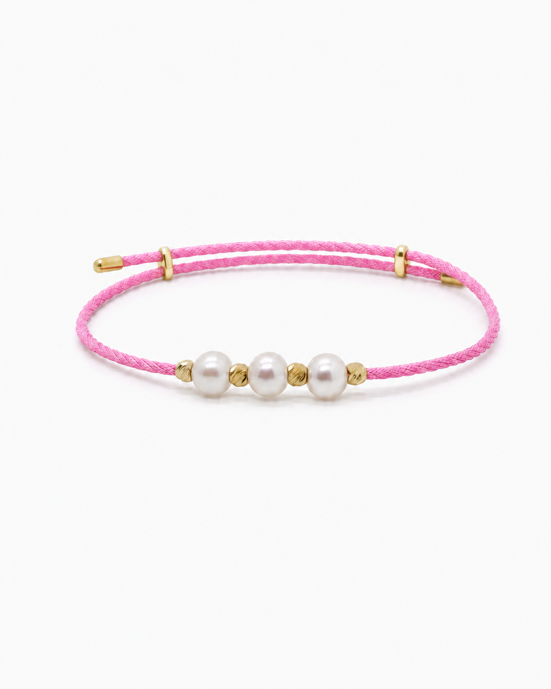 Pink bracelet with three pearls and gold accents on a white background #Color_Brilliant Rose
