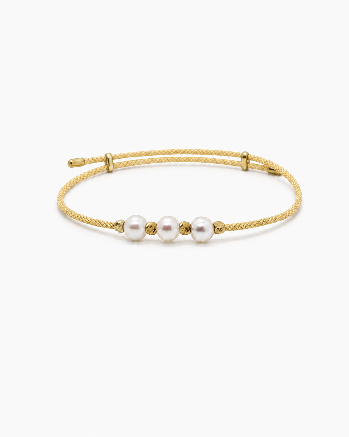 Gold bracelet with three pearls on a white background #Color_Gold