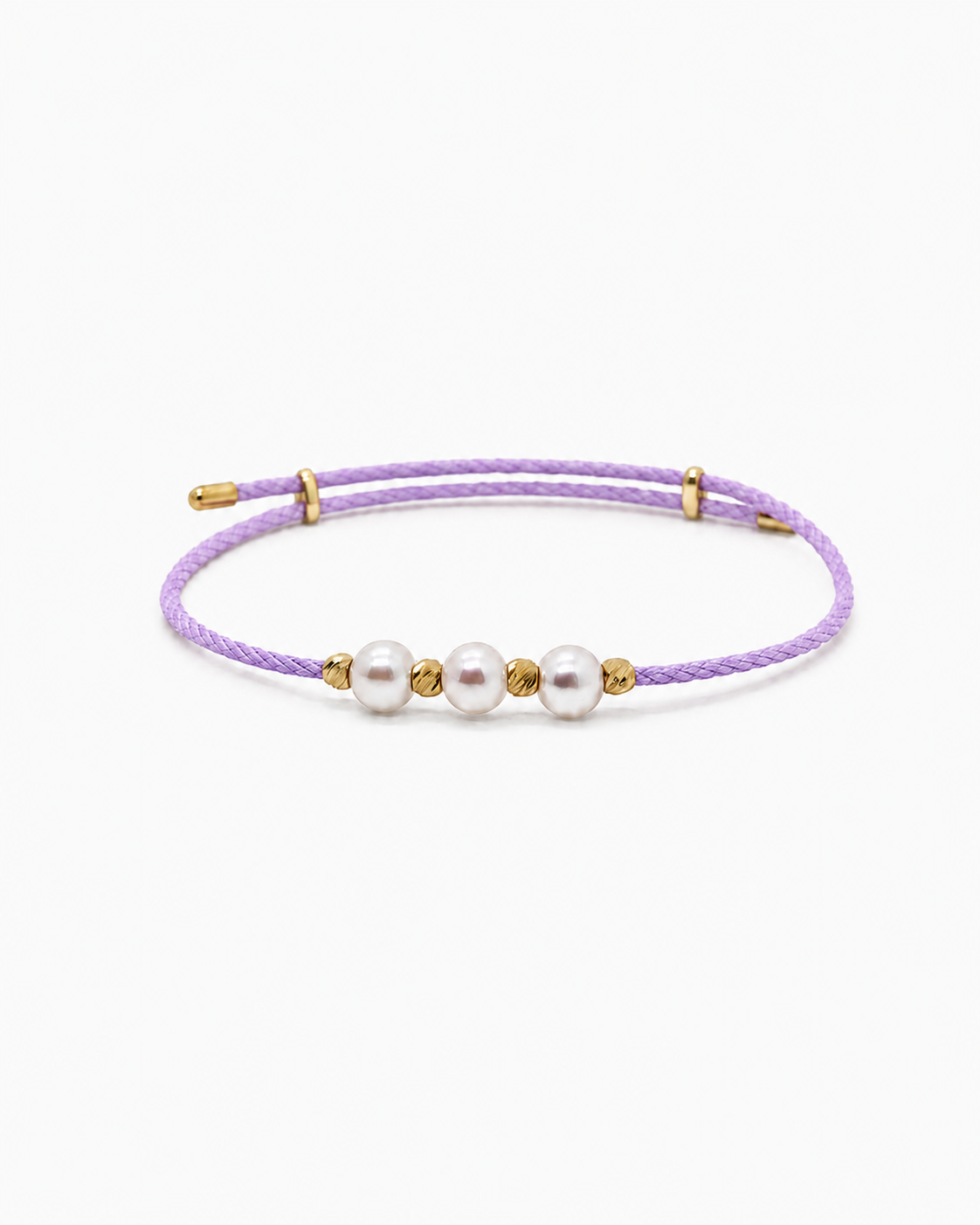 Purple bracelet with pearls and gold accents on a white background #Color_Light Lavender