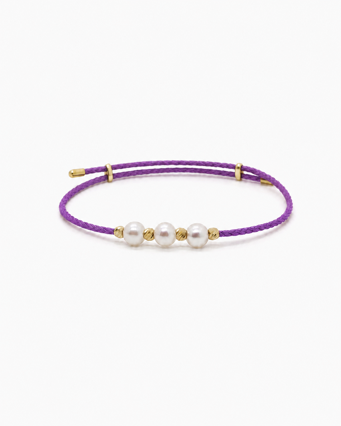 Purple bracelet with gold clasps and three white pearls on a white background #Color_Purple